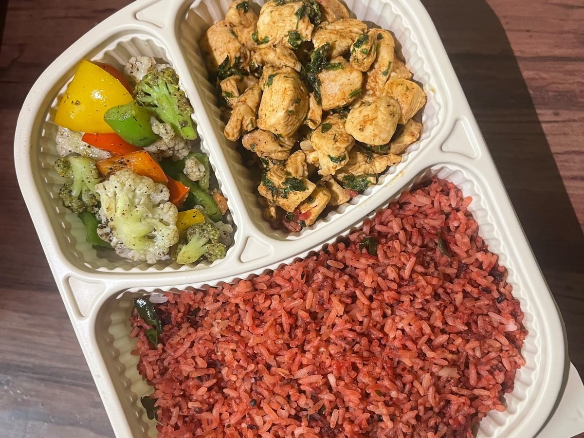 Herb chicken and red rice box: methi-coriander dry chicken with red rice and sautéed peppers, broccoli and cauliflower